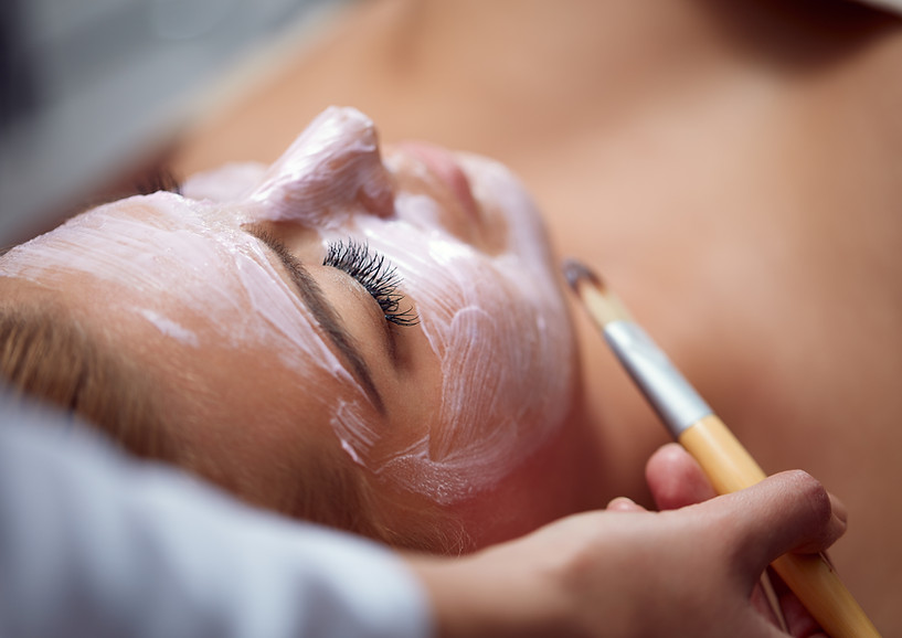 Beautiful young woman having a facial cosmetic treatment..jpg